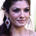 SINGAPORE - JUNE 09:  Bollywood actress Raveena Tandon poses at the IIFA awards green carpet event  at the 2012 International India Film Academy Awards at the Singapore Indoor Stadium on June 9, 2012 in Singapore.  (Photo by Suhaimi Abdullah/Getty Images)