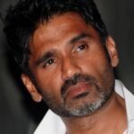 Indian actor Sunil Shetty attends a ceremony for the launch of debutante novelist Mohyana Srinivasan's novel ?The House on Mall Road? in Mumbai late February 8, 2010.  AFP PHOTO/STR (Photo credit should read STRDEL/AFP/Getty Images)